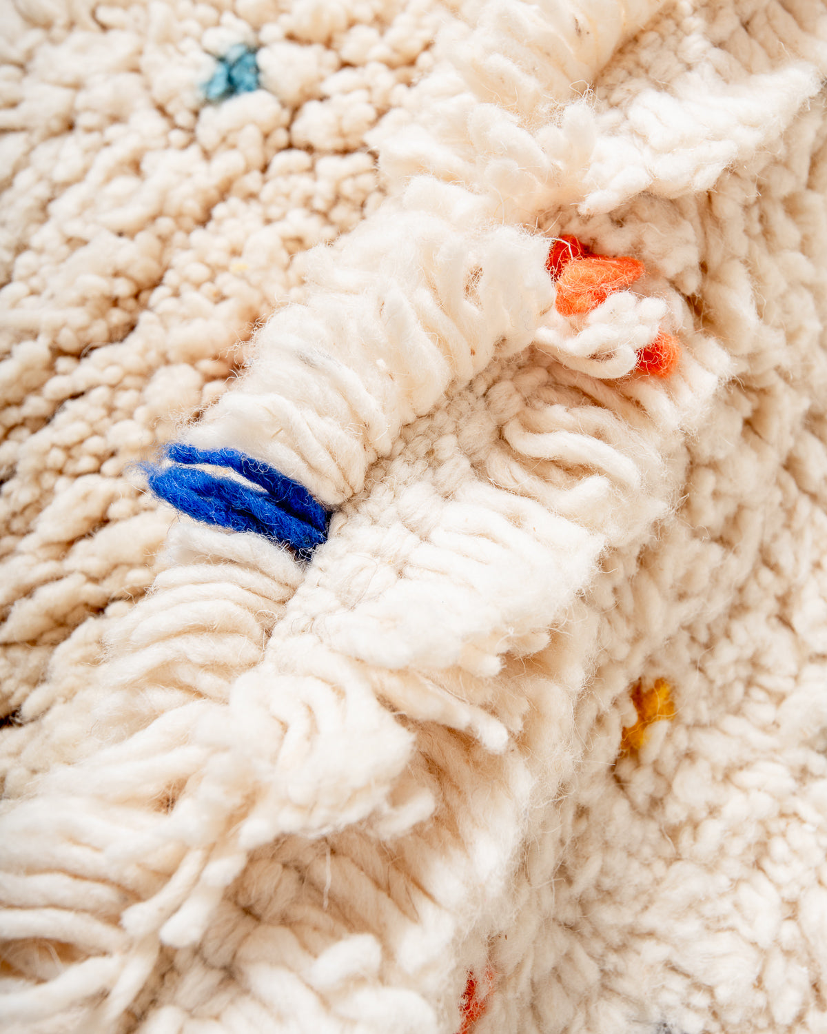 Modern, designer, handcrafted Berber rug from Morocco. Beniourain carpet with beautiful colours and patterns and fluffy wool texture.